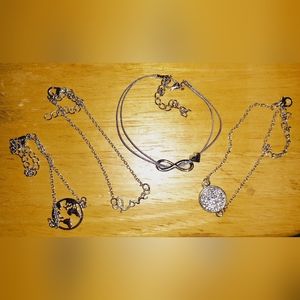 4 Bangle Bracelets Silver in Color